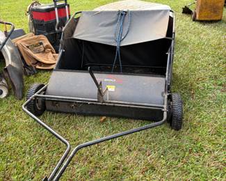 Tow behind lawn sweeper 