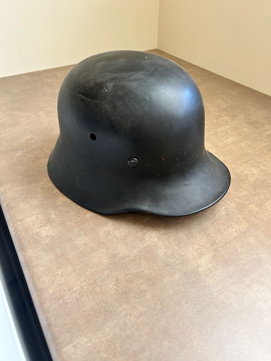 GERMAN WORLD WAR II HELMET (called a shell). Has a functioning strap and a clean helmet liner. Stamped ET64 is saying: “Made by Eisenhüttenwerke Thale, (Thale, Harz region, Germany)