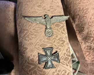 Vintage Nazi eagle pen and the iron cross marked 1939.