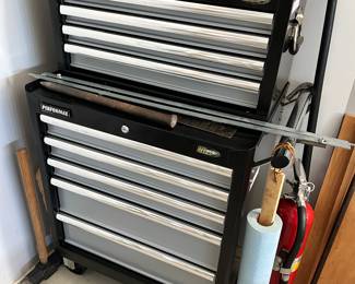 10 drawer Performax tool cabinet on wheels and has keys for bothe sections.