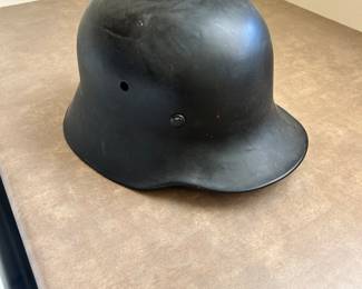 GERMAN WORLD WAR II HELMET (called a shell). Has a functioning strap and a clean helmet liner. Stamped ET64 is saying: “Made by Eisenhüttenwerke Thale, (Thale, Harz region, Germany)