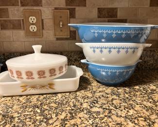 Fire King on the left and 3 pc Pyrex bowl set on the right.