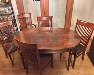 A beautiful dining room table and five chairs in great condition! Has two leaves.