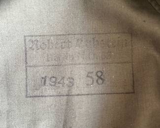Inside the German Field hat reads:                                        1st line (script): Robert Lubstein
2nd line (script): Berlin N.O. 55 → this is the address,
N = Nord (North) district, O = Ost (East),                     postal zone 55 in Berlin
3rd line (block numbers): 1943 55 → the first number is the year of manufacture, and the last (55) is the hat size in centimeters.