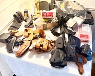 Gun holsters, cleaning, lock boxes and accessories 