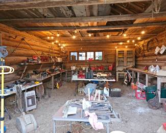 Log cabin on site filled with vintage tools, cookware - Wagner, Griswold