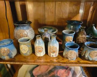 Beautifully crafted pottery with Indian emblems