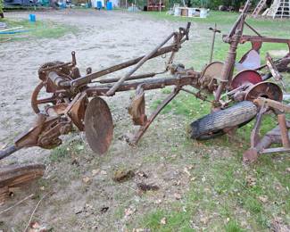Farm implements. Rusty Gold... old farm tools yard decor
