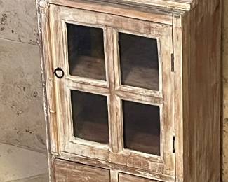 Distressed wood cabinet with two shelves