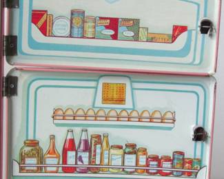 Beautiful lithograph art on the inside of the refrigerator.