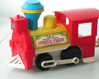 Engine and three train cars. No figures included. Other auction lot includes Animal Circus animal figures.