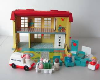 Fisher Price Hospital with 17 pieces, ambulance, furniture/equipment, and figures.