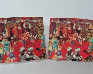 Two 1984 Vinyl Records "Feed The World" And "Do They Know It's Christmas Time"
