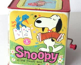 1968 Mattel Snoopy in the Music Box. Jack-in-the-Box that plays "All Around the Mulberry Bush" and then Snoopy pops up.