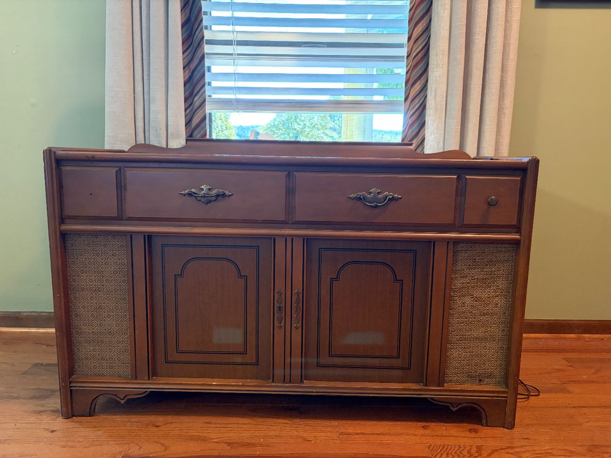 Magnavox stereo works very well, radio and recordplayer both sound is clean and clear! Plus Record storage.