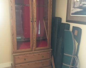 Gun Cabinet holder, & gun cases sold separately.
