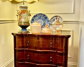 One of Pair of 20th Century Chests that are William & Mary Style, Burlwood Veneer, three drawers with a Serpentine Fronted Case. One of Pair of French 19th Century Porcelain Urn Table Lamps Hand Painted.