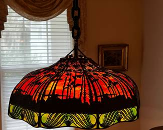 American, Handel, in the "Sunset Palm Tree" pattern. Slag Glass and Metal Frame with Multicolored Glass Panels