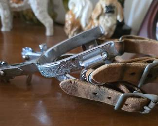 authentic set of spurs with leather straps