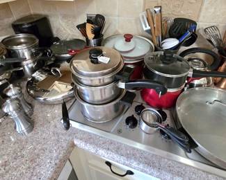 large selection of pots and pans, cookware, bakeware, etc