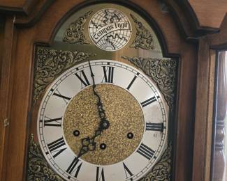 Tempus Fugit Roman Numeral clock face on the Grandmother clock