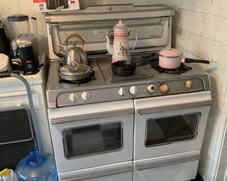 It's not terribly often you see a double-oven, but here is one of them.  Measure your available space, then come on by to measure this one.