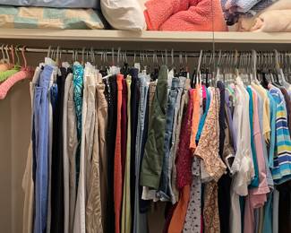 Women’s capris pants, shorts, short sleeve shirts and blankets 