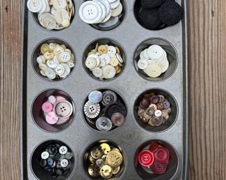 You'll find a sweet selection of fancy buttons of all kinds at this estate sale (along with a dressmaker's form, boxes of threads and sewing supplies, books about sewing, and more!)