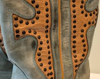 Closeup of the pair of Frye "Daisy Duke" cowboy boots, blue leather with studded snakeskin accents, size 10M