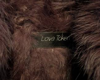 Closeup of Love Token brown dyed rabbit fur vest