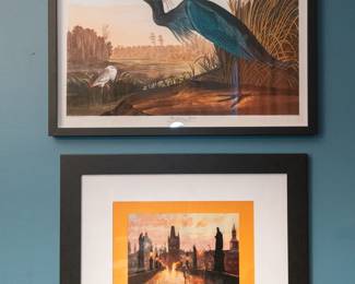 A framed Blue Crane or Heron color illustration print by John J. Audubon, and a signed European street scene painting dated 2006