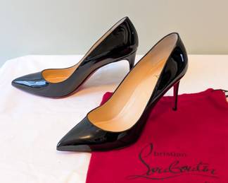 Pair of Christian Louboutin Paris black patent leather pumps high heels size 40-1/2 with original red cloth carrying bag