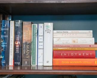 Vintage books including  The Red Tent by Anita Diamant, A Discovery of Witches by Deborah Harkness, Collection of Poems by Edna St. Vincent Millay, Seamus Heaney 100 Poems, Hymns, Prayers and Song by John L. Foster