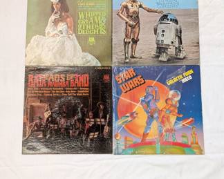 Vintage vinyl LP albums including Whipped Cream & Other Delights by Herb Alpert's Tijuana Brass, Baja Marimba Band, The Story of Star Wars soundtrack, and Star Wars and Other Galactic Funk by Meco