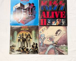 Vintage vinyl record albums from KISS and AC/DC