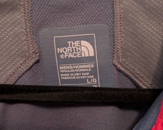 Closeup of men's The North Face Windstopper jacket light blue, size L