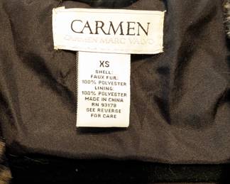Closeup of Carmen Marc Valvo faux fur leopard print hooded vest size XS