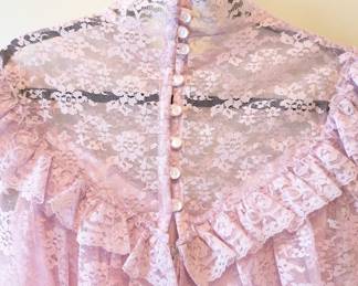 Closeup of the vintage formal pink ruffled maxi dress