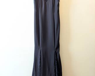 A vintage Roberta black formal sheath dress with shoulder straps and lace inserts, size 9/10