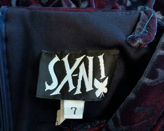 Closeup of blue and purple floral velveteen spaghetti strap mini dress size 7