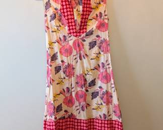 Cute vintage sleeveless short dress, floral pattern and polka dots