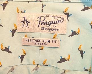 Closeup of Penguin by Munsingwear light blue long-sleeve button front shirt with toucan bird pattern