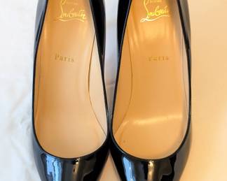 Another view of the pair of Christian Louboutin black patent leather pumps high heels size 40-1/2