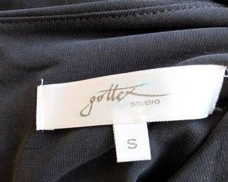 Closeup of Gottex Studio black sleeveless drape front dress size S