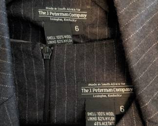 Closeup of The J. Peterman Company pinstripe wool short dress with three-button blazer, size 6