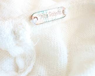 Closeup of Free People hummingbirds hearts lightweight linen back tie top