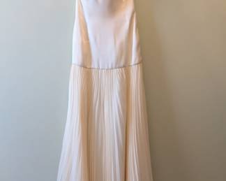 Carmela Lu Tera strapless white dress, fitted bodice with pleated chiffon skirt