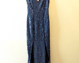 A midnight blue sequined v-neck formal dress