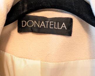 Closeup of the beautiful Donatella pale gold wool blend belted trench coat 