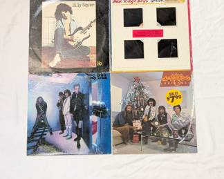 Vinyl records including Billy Squier / Don’t Say No, Oak Ridge Boys / Greatest Hits Vol II, Cheap Trick / All Shook Up, The Oak Ridge Boys / Christmas
